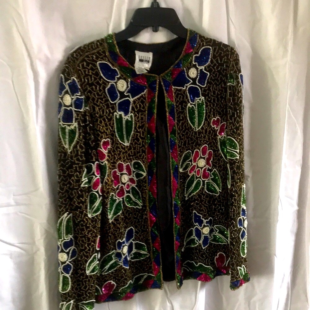 Evening 100% Silk jacket with beats says Xl but actually can fit large to medium
